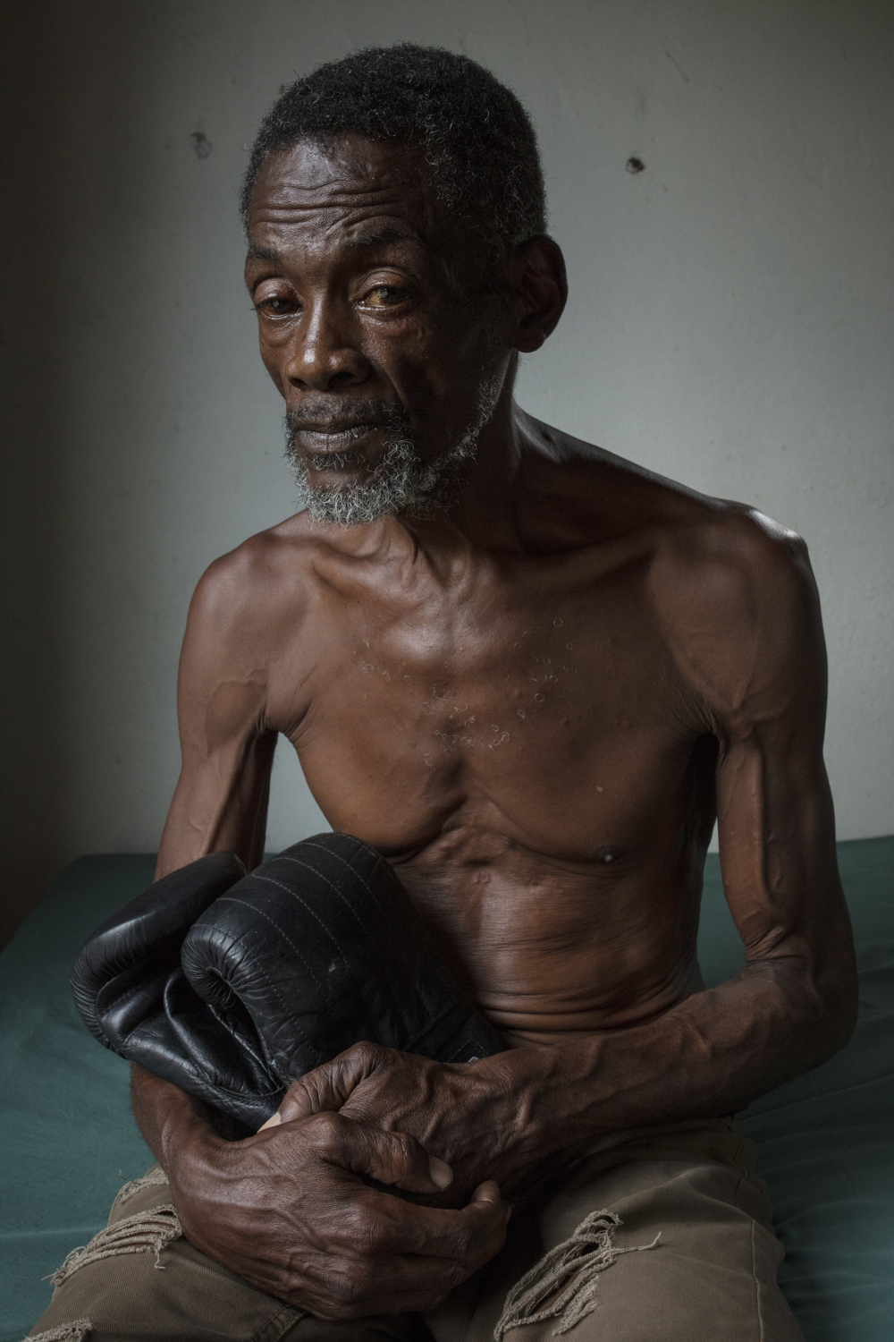 Vernon Vanriel, a former boxer and victim of the Windrush scandal, at his home in Savanna-la-Mar, Jamaica, 2018. Photograph by David Levene.