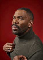 Actor Colegan Domingo poses against a red backdrop. London. Photograph by David Levene 22 November 2023