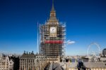 Houses of Parliament. Palace of Westminster. Aerial view of Big Ben's Elizabeth Tower encased in scaffolding during major restoration works, with the London Eye Ferris wheel and River Thames visible against a clear blue sky. London. Photograph by David Levene 6 November 2017