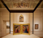 Gallery interior at The Courtauld, London, displaying a gilded Renaissance diptych of the Annunciation beneath an ornate painted ceiling. Photograph by David Levene 5 November 2021