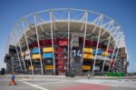 Stadium 974, one of the eight stadia that will be used in the FIFA World Cup tournament in Qatar in November and December 2022. The 974 stadium has a modular design, and incorporates 974 recycled shipping containers in homage to the site's industrial history and the international dialling code for Qatar (+974). Some of the containers house stadium amenities such as bathrooms and concessions. The shipping containers and seats used by the stadium are later to be dismantled and provided as assistance to underdeveloped countries in Africa; it is the first temporary venue in FIFA World Cup history.' Doha, Qatar. Photograph by David Levene 30 March 2022