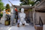 Marc Quinn attends to his finished sculpture at The Cervietti marble sculpture workshop in Petrasanta, Tuscany, Italy. By David Levene 1 September 2005