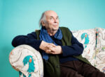 Quentin Blake, British illustrator best known for his collaboration with Roald Dahl and his distinctive pen-and-watercolour style, seated on a sofa upholstered with his own parrot illustrations, London. Photograph by David Levene, 29 February 2020
